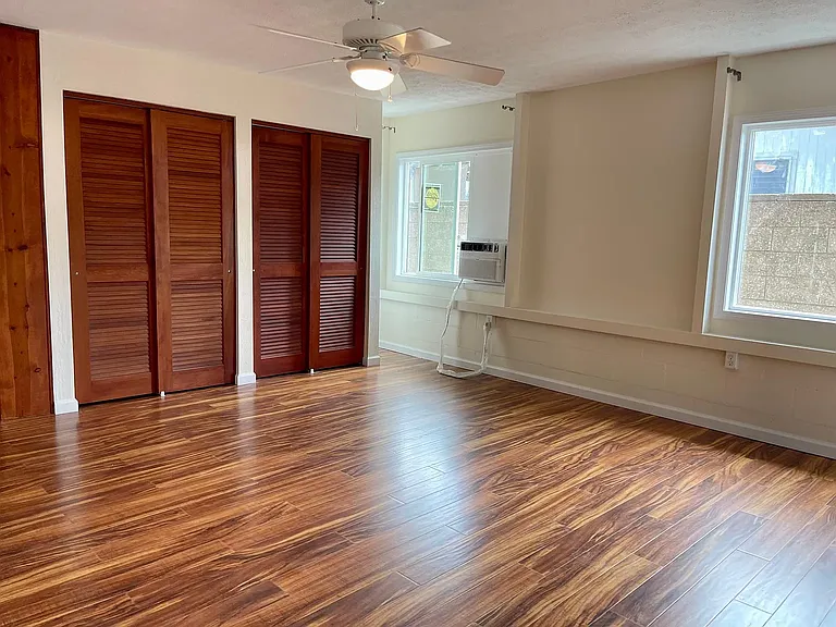 Bedroom has AC, ceiling fan, and lots of closet space!