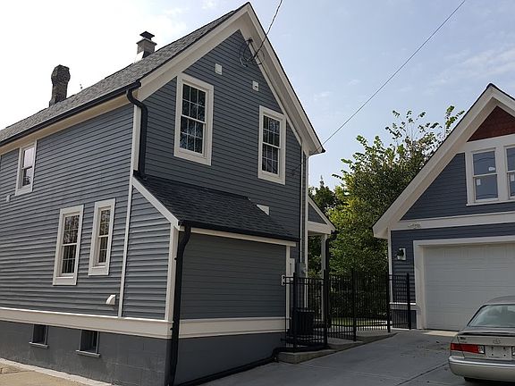 Rear view w/new garage 