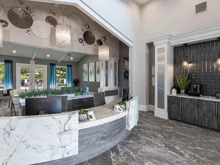 Step into our modern leasing office, where our friendly team, sleek design touches, and complimentary coffee station are ready to welcome you.