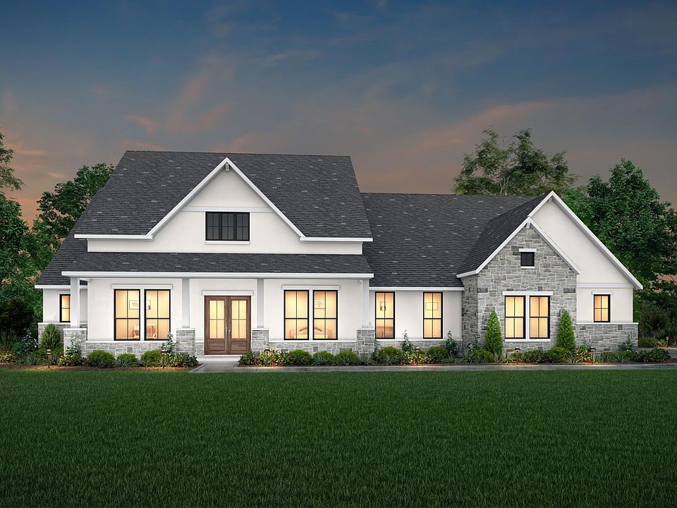 stone and stucco house with front porch