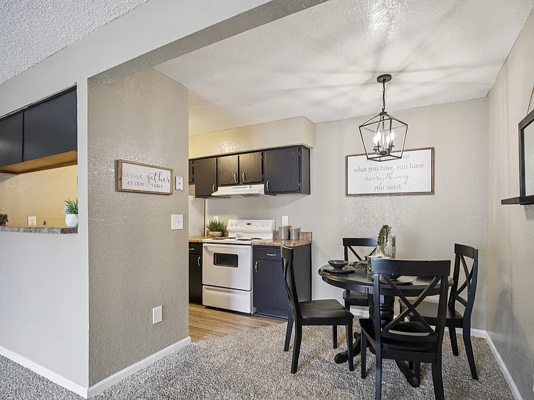 Two-bedroom, one bath dining and kitchen.