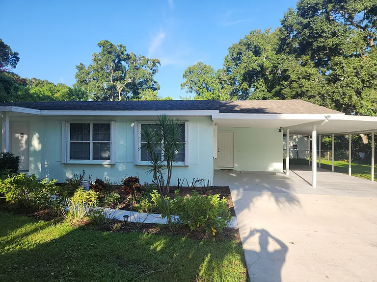 Front of home, faces east