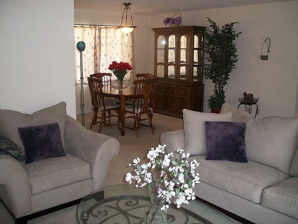livingroom with dining area beyond