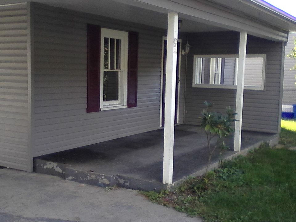 Front porch beside carport