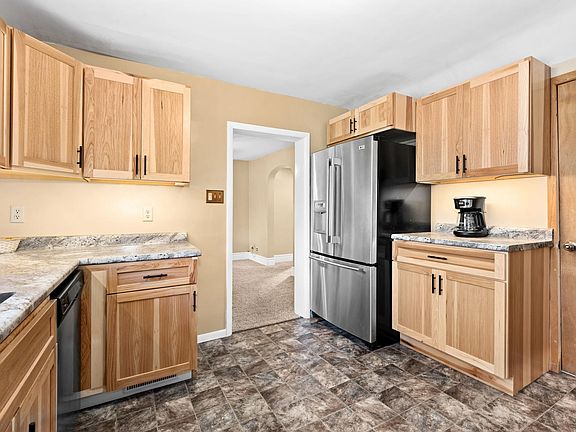 Large full size LG fridge with filtered water on french doors