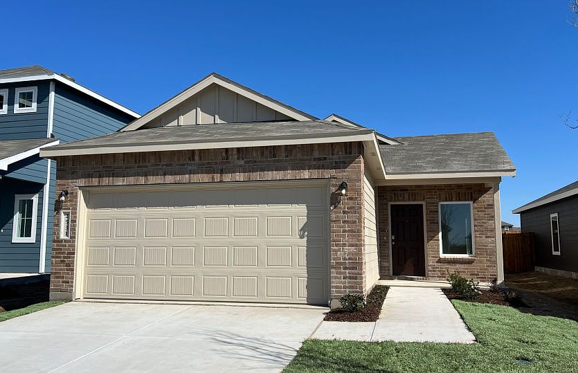 The Frio, a two-story home with 2-car garage, home exterior LS103 exterior features may differ