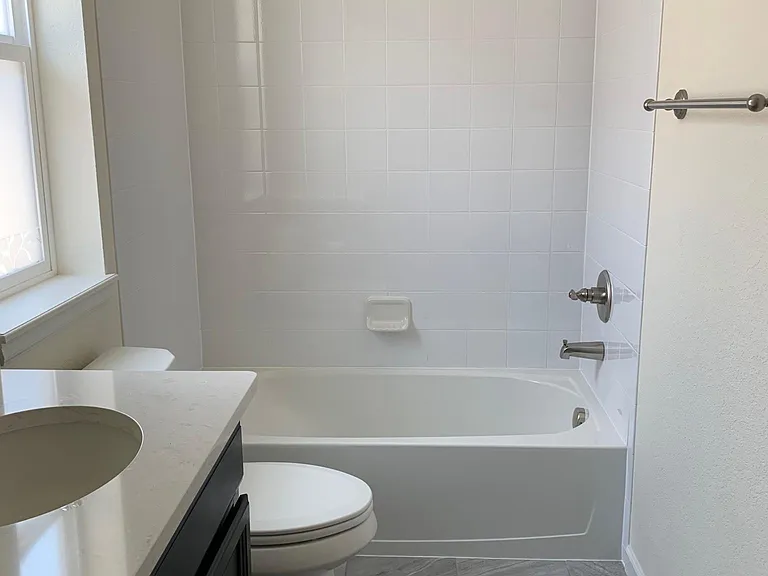Full bathroom, shower/tub combo, double sinks
