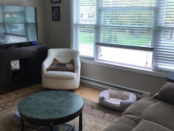Upstairs living-room with big window to see entire street or front yard.