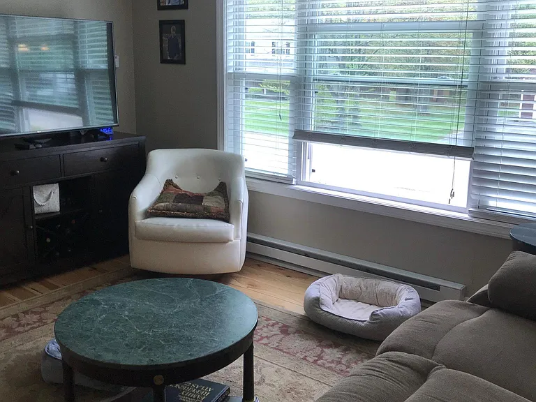 Upstairs living-room with big window to see entire street or front yard.