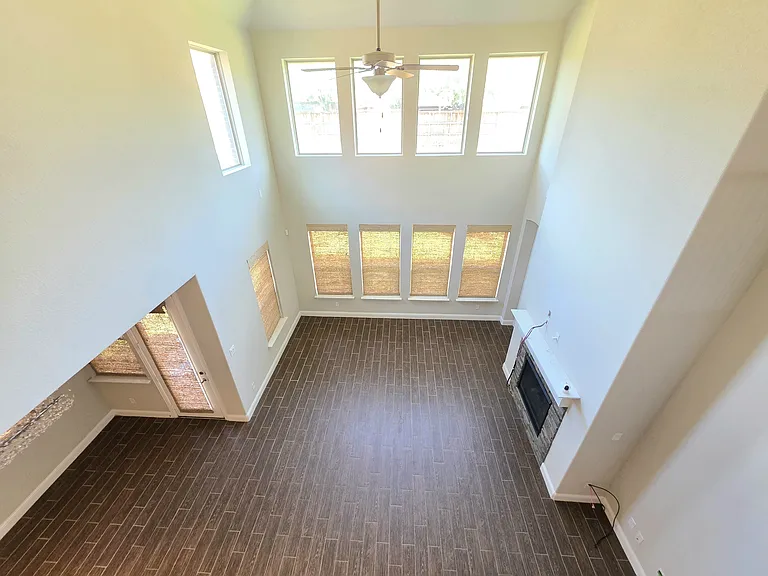 Open concept living and family room with high ceilings
