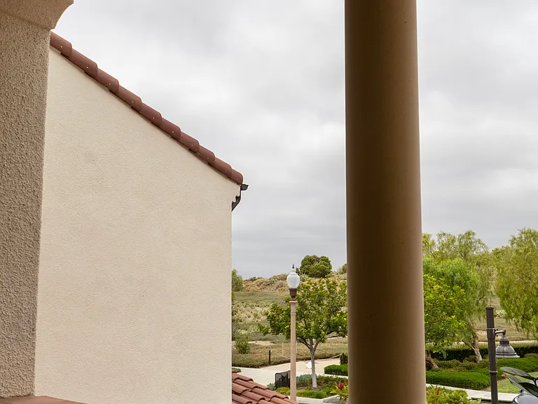 Outdoor Patio: Another view capturing the expansive nature reserve that sits directly in front of the space.