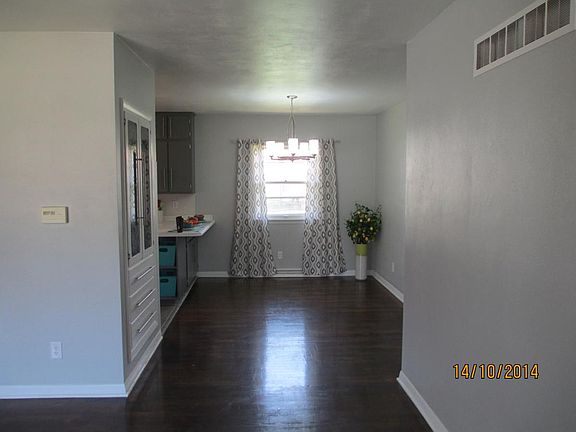 Dining space off kitchen with built in hutch.