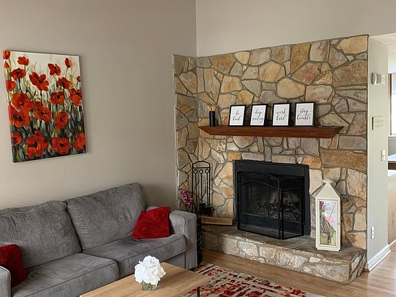 Living Room with working wood fireplace