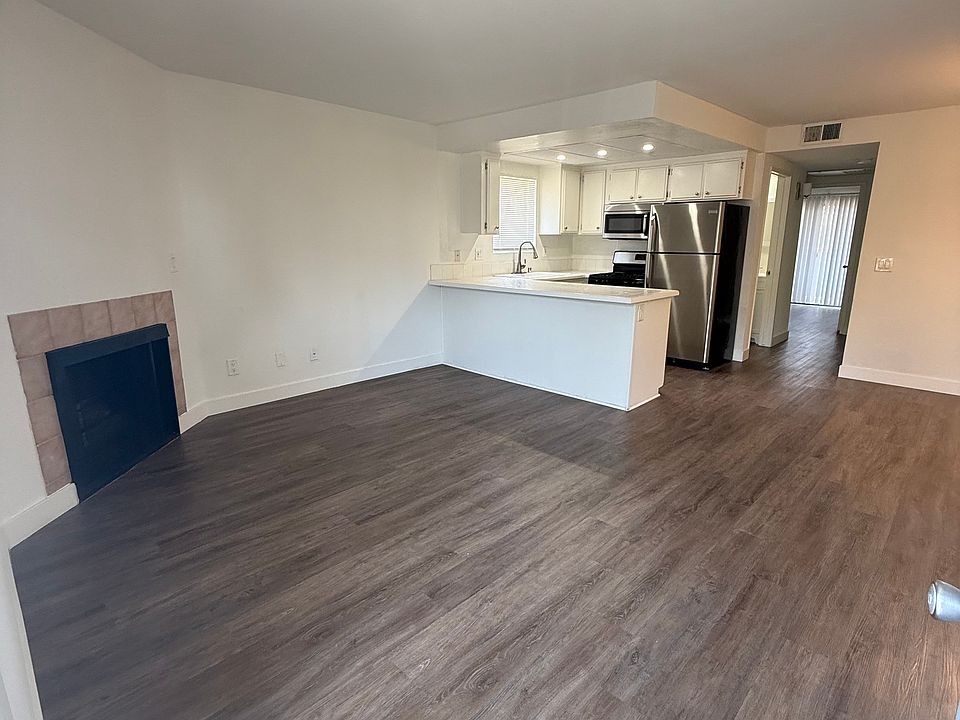 Living/front room with a working fireplace