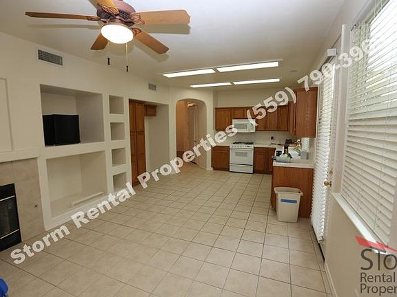 Living room, Gas Fireplace, & Ceiling fan