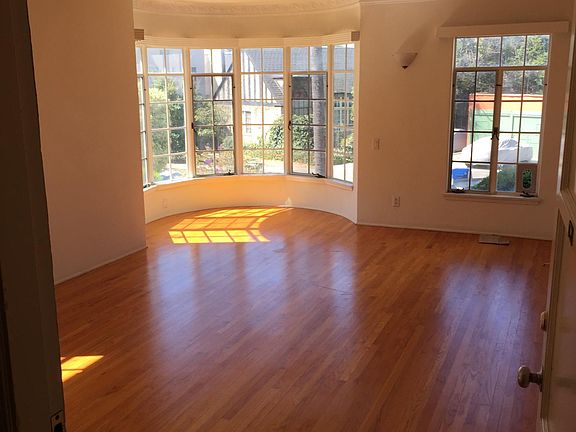 View into street from front door- see circular window area