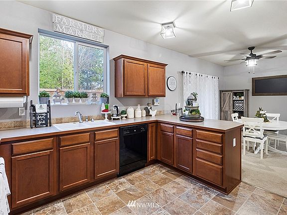 Another view of the Kitchen, lots of Cabinets!