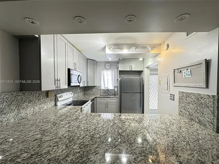 9370 SW 8th St #107 — Photo 11