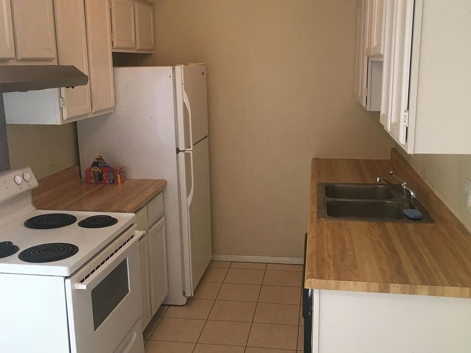 Updated Kitchen includes Refridgerator, Electric Stove, and Dishwasher.