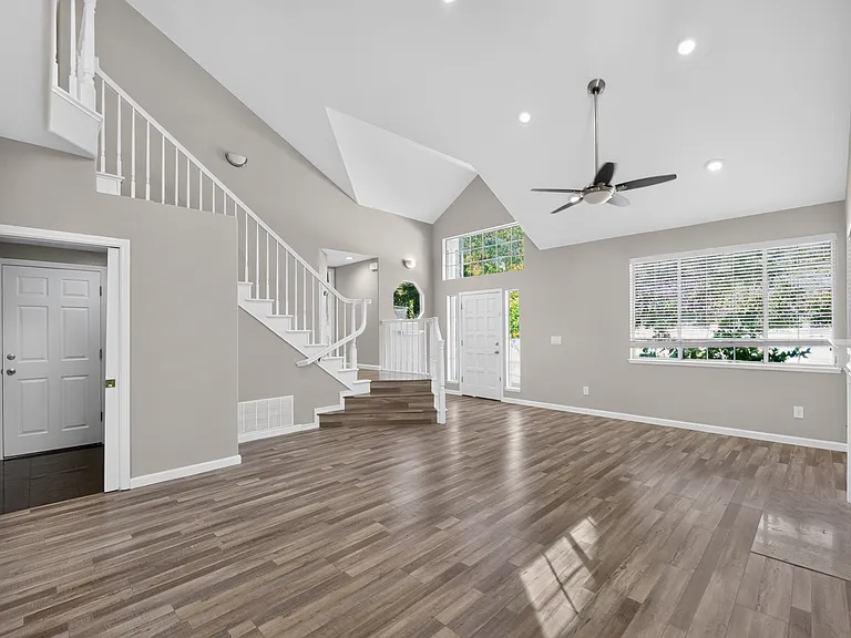 Living Room with Tall Ceiling and abudant natural light