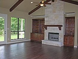 spacious living with handscraped hardwood floors
