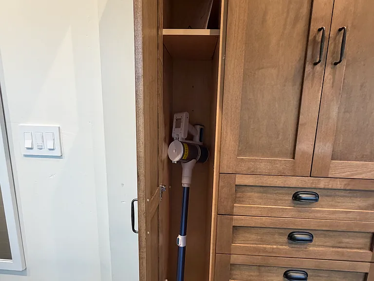 Vacuum/ storage closet
