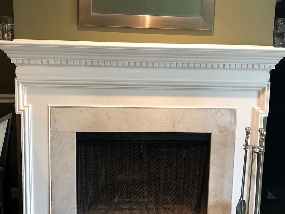 woodburning fireplace in living room