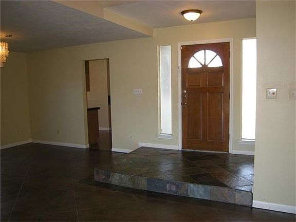 Foyer with slate tile