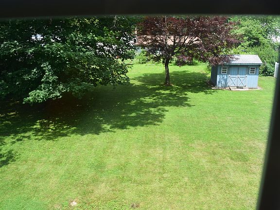 Back yard view from one of the bedrooms. Tenant has full access to the storage shed as well.