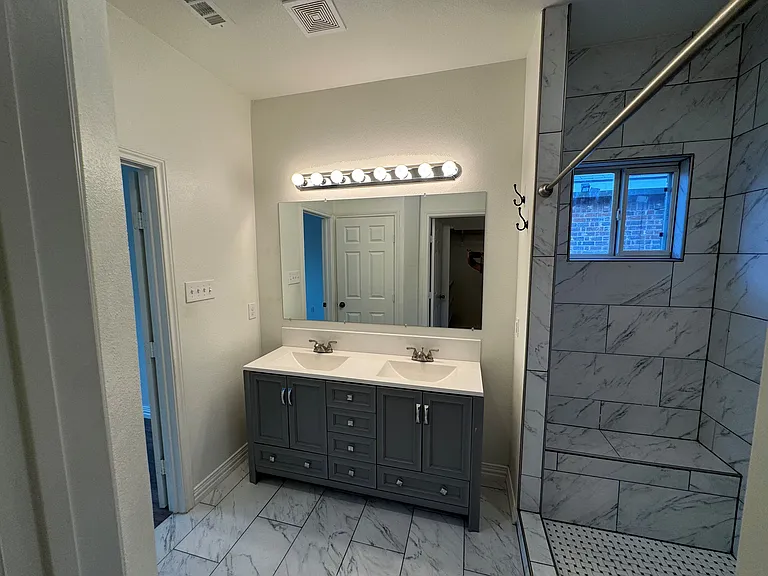 Frontal view of the MB sinks and toilet door