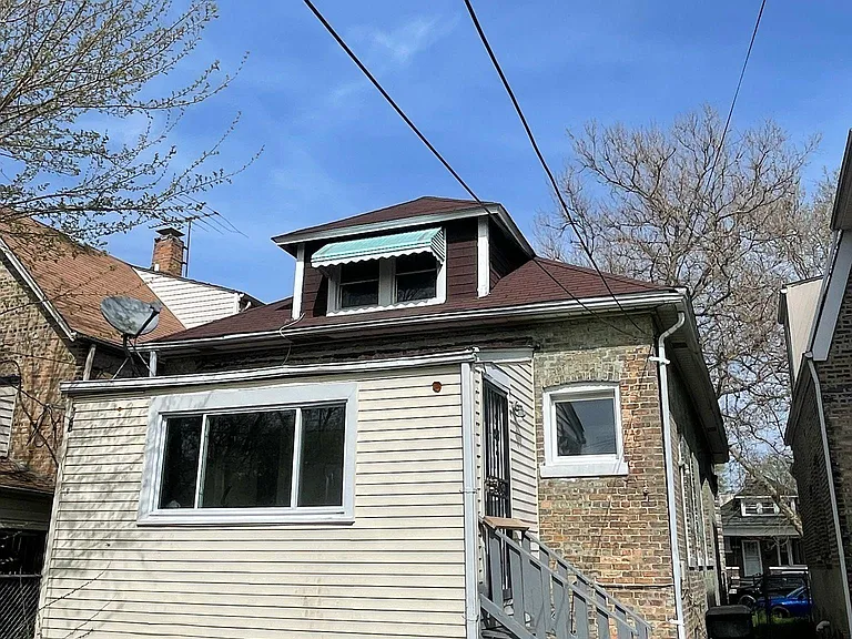 7636 S Eberhart Ave — Photo 4