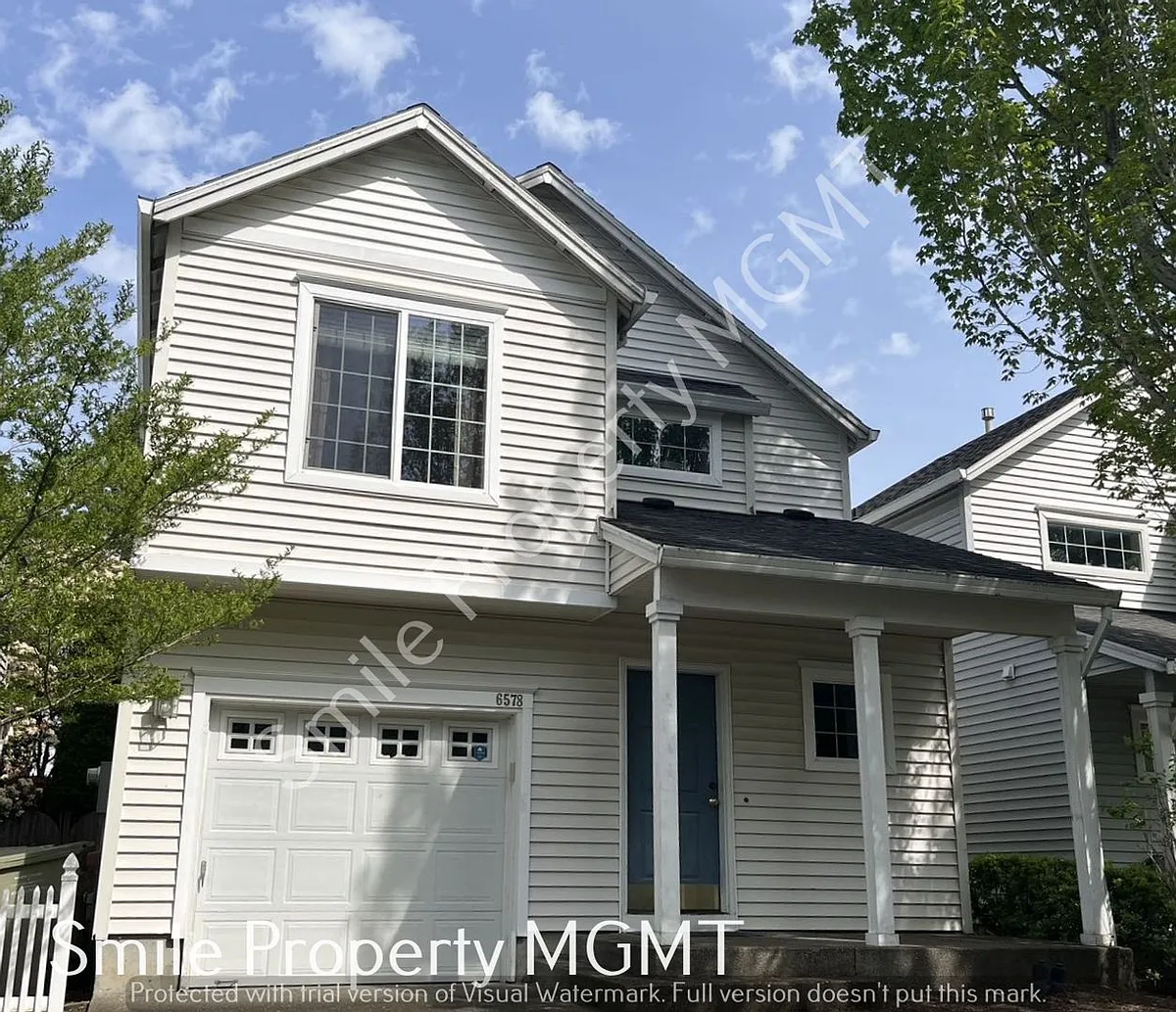 Building Photo - 6578 NW Wenmarie Dr