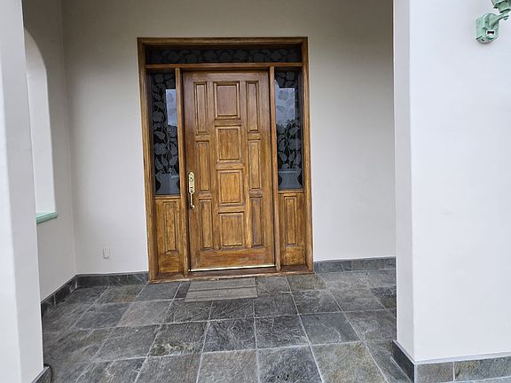 Separate grand entrance.