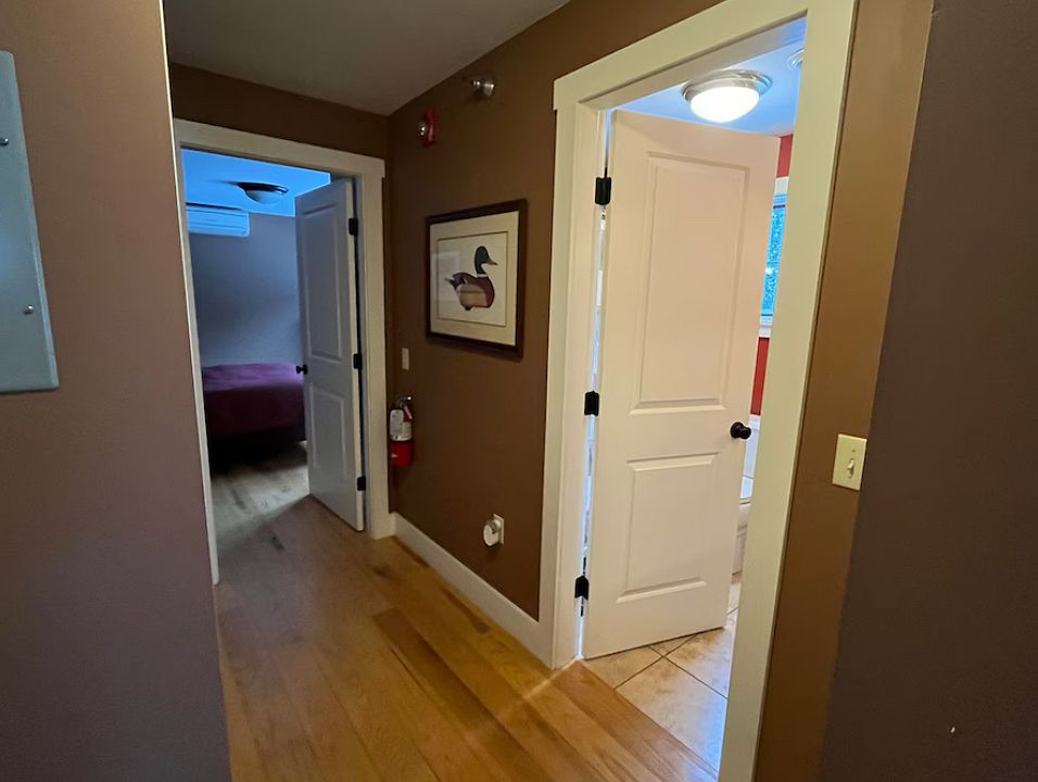 hallway to bathroom and bedroom