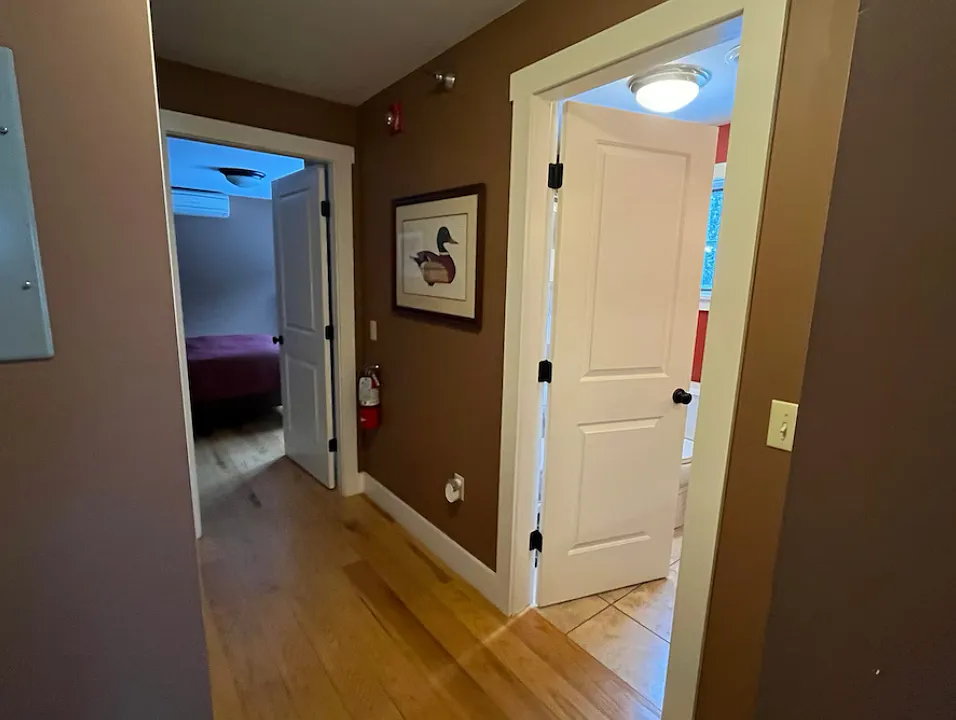 hallway to bathroom and bedroom