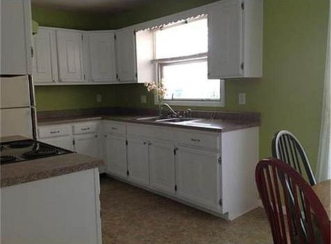 Newer flooring, countertops and faucet.