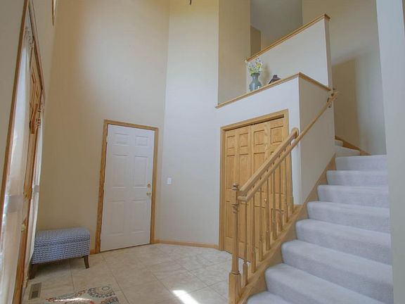 Towering, beautifully tiled foyer welcomes you and your guests.