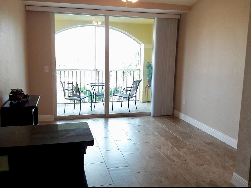 Living room with large screened balcony