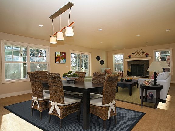 lovely great room concept with open living dining combination with cozy gas fp