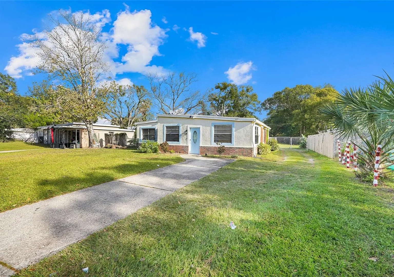 This charming 3 Bedroom, 2 Bath Single Family Home For Rent at 107 Garrison Dr. Sanford, FL 32771 — Photo 2