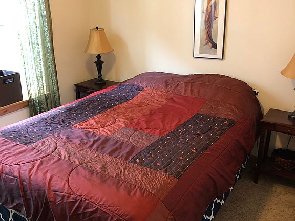 Bedroom 2 with queen bed and large closet.