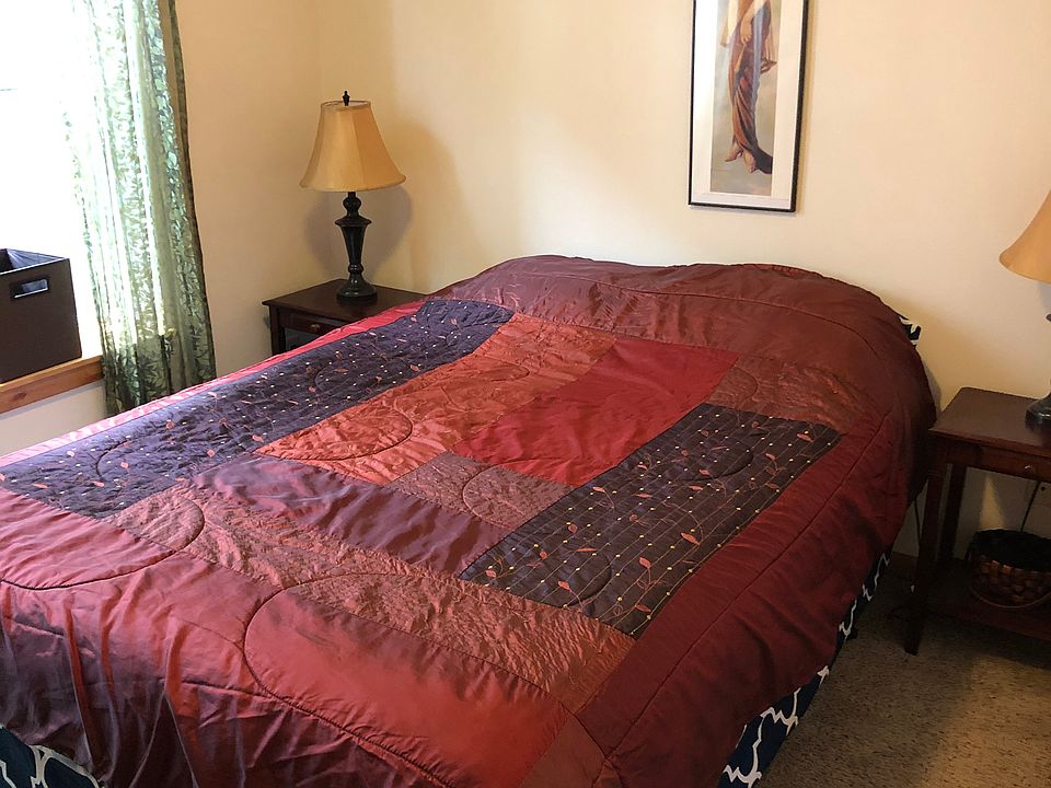 Bedroom 2 with queen bed and large closet.