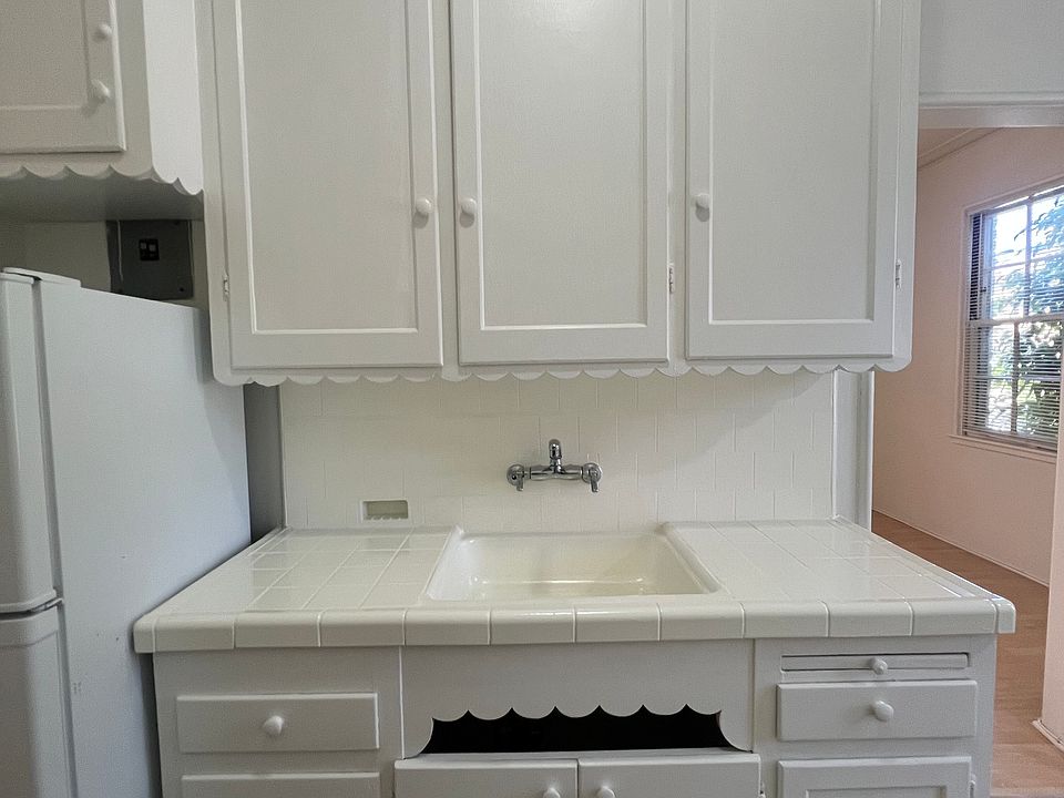Vintage kitchen with original trim and ample cabinets