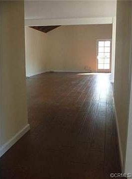 Entry area leading into the living room.  Brand new hardwood flo