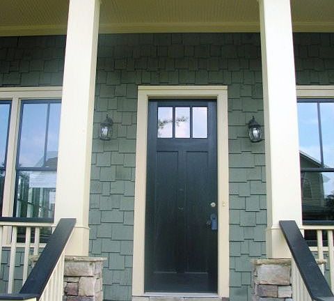 Big front porch and craftsman style front door.