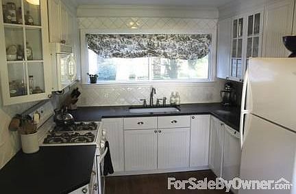 Kitchen with Custom Cabinets and Granite