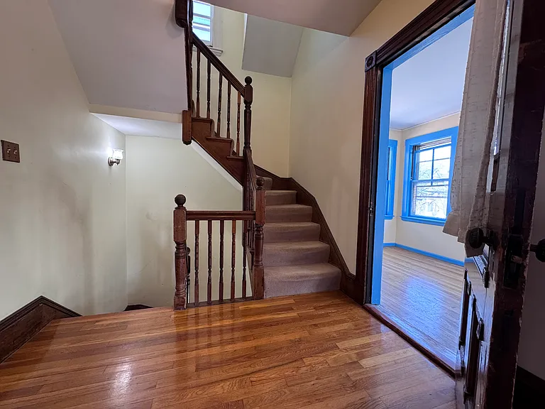 Stairs to upper floor of apartment