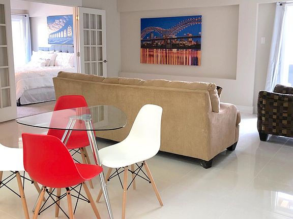 The Pat: 1 BD / 1BA. French doors. Ultra-modern white tile. Shown with transitional decor.