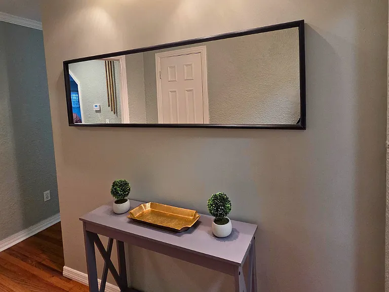 Beautiful decorative space with mirror and elegant table setup