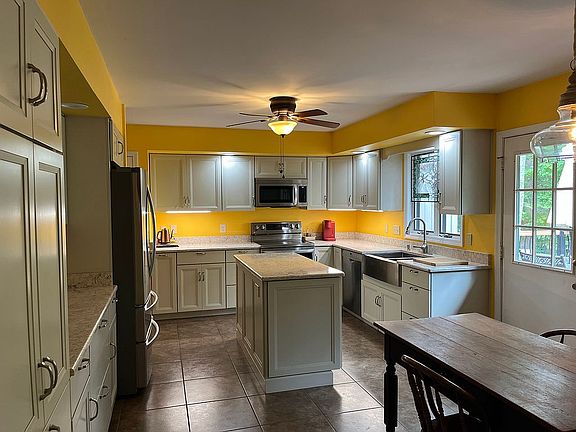 Kitchen has custom cabinets